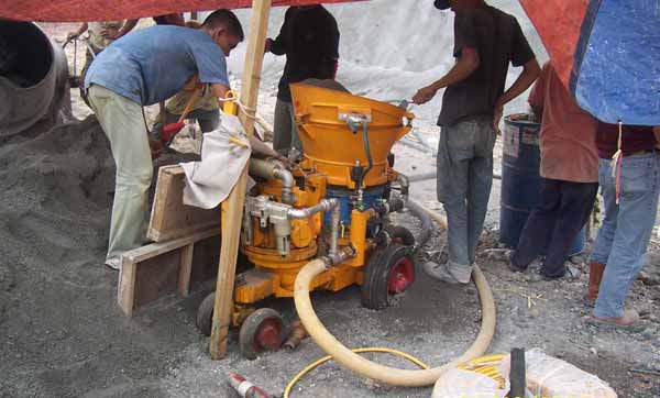 Shotcrete machine for dry concrete spraying